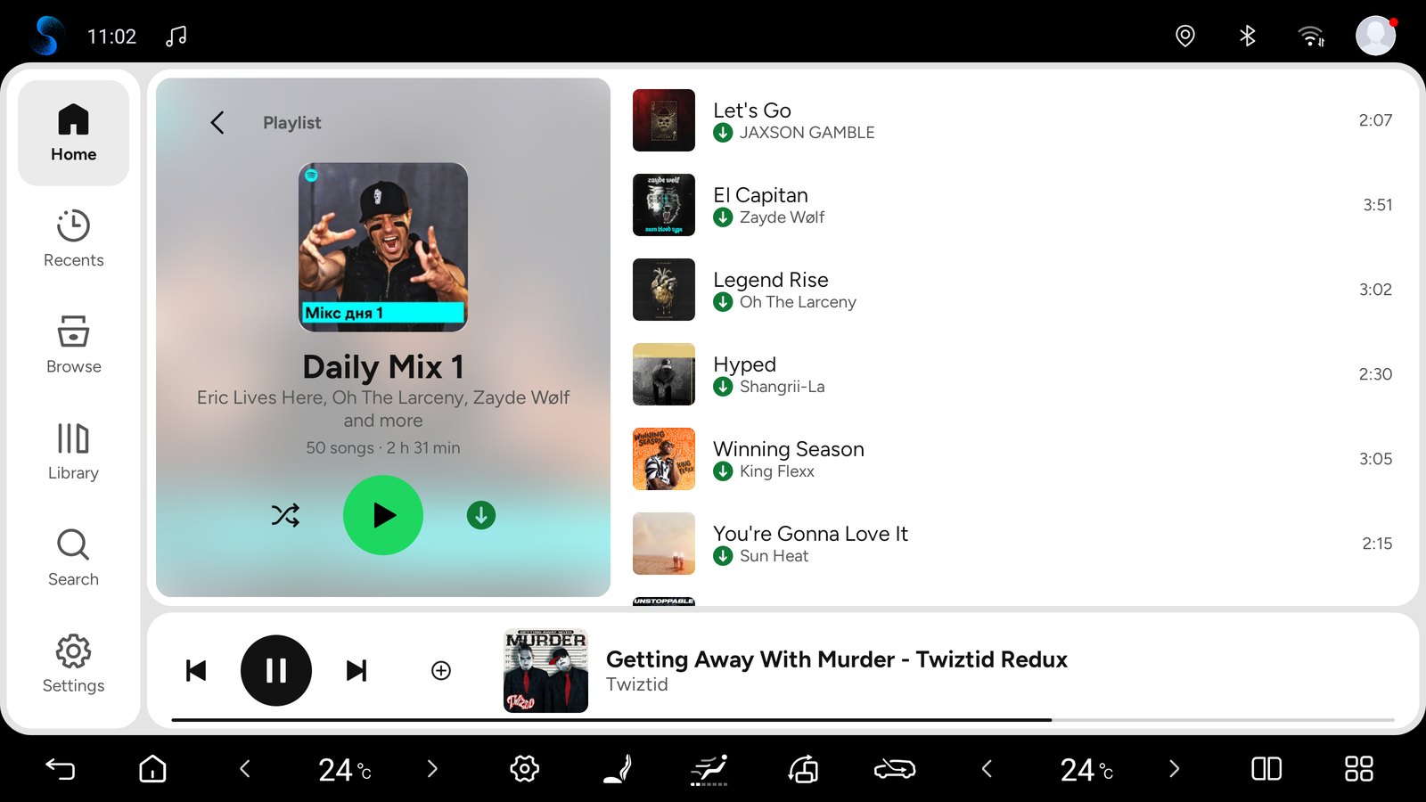 A playlist on its blurred cover, with downloaded songs marked, day theme